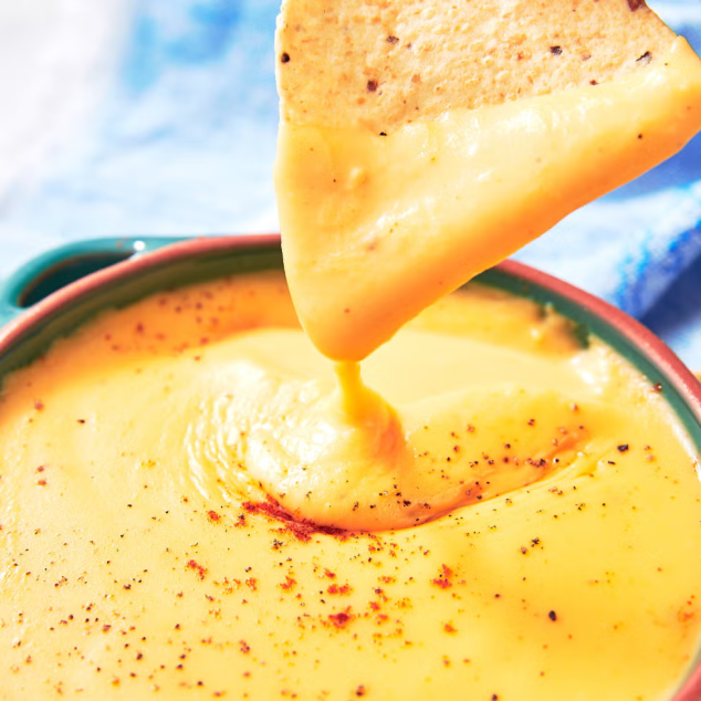 Game Night Isn’t Complete Without This Simple Nacho Cheese Sauce - Image 2