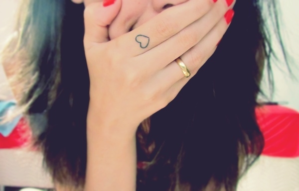 Heart tattoo on finger