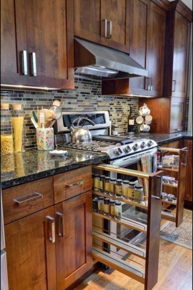 Slide-out spice rack on either side of stove