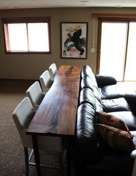 Table seating behind rec room couch