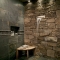 Shower with stone and waterfall spout