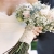 Beautiful brides bouquet with matching lace wrap and broach - Wedding Flower Ideas